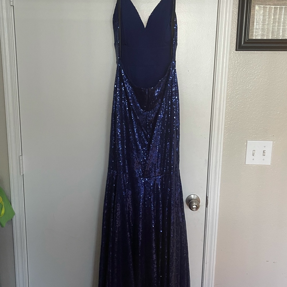 Backless dress from Windsor. Perfect for the holiday season